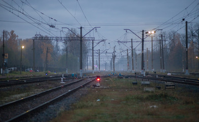 Railroad tracks in foggy morning