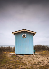 Blue wooden beach hut