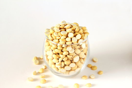 traditional indian roadside street snack food roasted chickpea nut daliya dalia or chana dal  isolated on white background