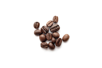 Roasted coffee beans isolated on white background. Close-up.