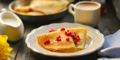 pancakes crepes fritters with raspberry berries (pancakes with filling) Shrovetide. food background. top view