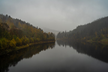 View of Elbe river and surrounding mountains - Giant Mountains (Krkonose). Small town of Spindleruv Mlyn and Labska village. Czech Republic.