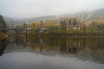 View of Elbe river and surrounding mountains - Giant Mountains (Krkonose). Small town of Spindleruv Mlyn and Labska village. Czech Republic.