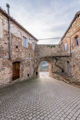 Fototapeta premium The Via Tonda of the uninhabited medieval village of Murlo, Siena, Tuscany, Italy