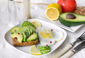 avocado, sesame and lemon sandwich, scrambled eggs