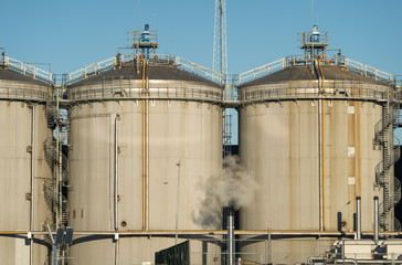 Production location with large tanks of chemical industry.