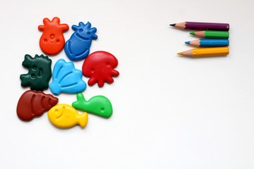 Volumetric colored pencils isolated on a white background.