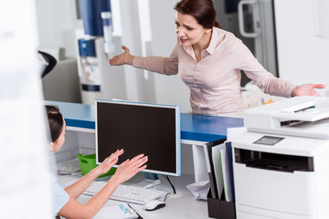 Stressed patient talking to nurse in clinic