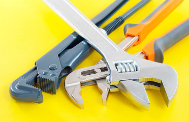 three keys on yellow