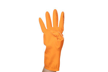 Hand in orange rubber glove shows a sign or symbol four quarters.