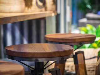 Fototapeta na wymiar Picture of wooden round chairs in coffee shop