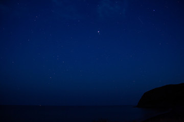 Fototapeta na wymiar Stars over the deserted Crimean coast