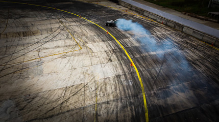 Top view Aerial view photo driver drifting car on asphalt track,Car drift  © jamesboy