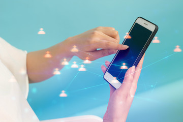 girl with smartphone and blue background for network concept