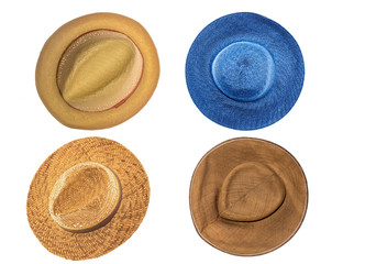 Set of four straw hats isolated on white background