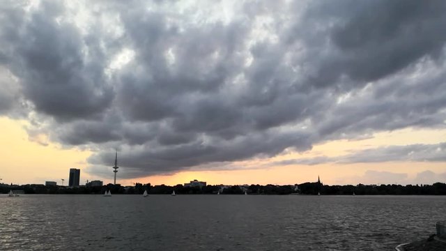Alster lake dramatic sky, water sports footage video 1080p full HD