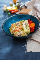 Andalusian fish, saffron rice with vegetables