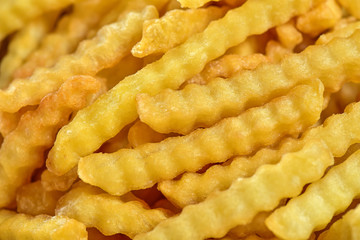 Crinkle fries pile close up