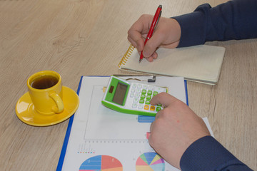 Businessman analyzing report, business performance concept. Businessperson working
