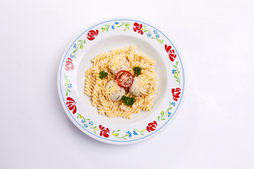 pasta with meatballs on the white background
