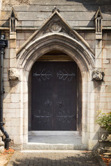 Fototapeta na wymiar Church arched stone doorway