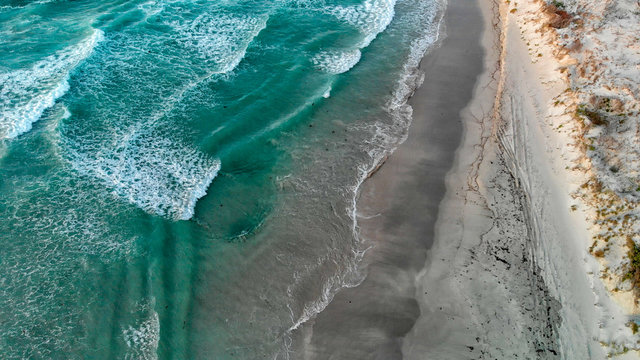 Waves on the beach, overhead aerial view