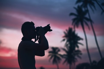 Silhouette of the photographer at sunset