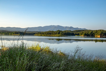 Pong Chor Reservoir in Mae Wang National Park Chiang Mai, Thailand. Photo in aerial view by drone with beautiful nature.  Abstract of peaceful, peace wallpaper background.