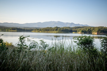 Pong Chor Reservoir in Mae Wang National Park Chiang Mai, Thailand. Photo in aerial view by drone with beautiful nature.  Abstract of peaceful, peace wallpaper background.