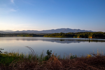 Pong Chor Reservoir in Mae Wang National Park Chiang Mai, Thailand. Photo in aerial view by drone with beautiful nature.  Abstract of peaceful, peace wallpaper background.