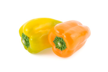 fresh Aura sweet yellow, orange peppers on white background