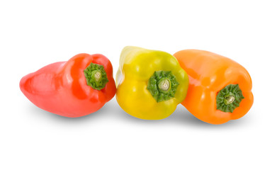 fresh Aura sweet red, orange and yellow-green peppers on white background