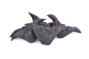 Fototapeta premium boiled bull horn Shaped Water Caltrop nut on white background