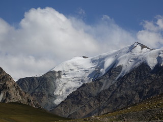 Glaciers and the road to the pass "Barskon" 3816 m., In Kyrgyzstan. August 2018.