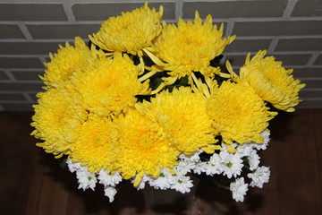 bouquet of flowers on wooden background