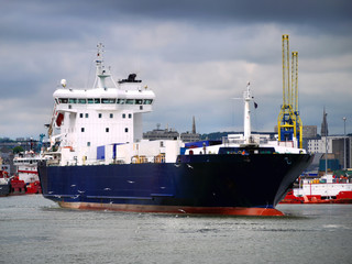 Fototapeta premium Roll on - Roll off cargo ferry leaving port.