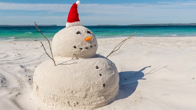4K Time lapse video with zoom effect of Australian Christmas Sandman on a beautiful white sandy beach