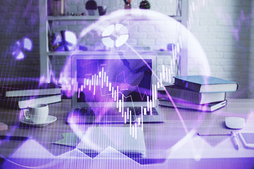 Double exposure of stock market chart and office desktop on background. financial strategy concept.