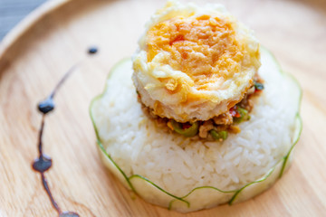 Original fried basil with pork served with jasmine rice and fried egg.