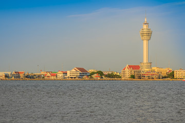 Obraz premium Riverfront view of Samut Prakan city hall with new observation tower and boat pier. Samut Prakan is at the mouth of the Chao Phraya River on Gulf of Thailand.