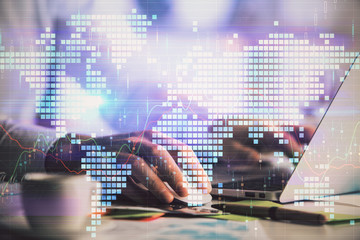 Double exposure of World map polygonal with person typing on laptop. Globalization concept.