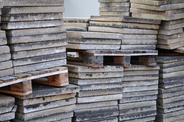 concrete floor plates stacked up at construction site