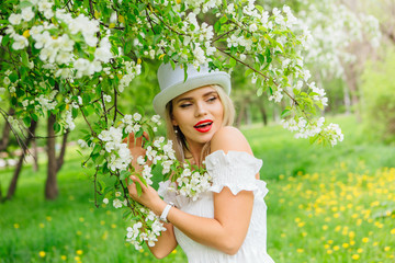 Sexy modern bride in white cylinder hat