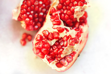 pomegranate seeds close-up. pomegranate on a light background