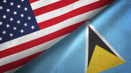 Fototapeta premium United States and Saint Lucia two flags textile cloth, fabric texture