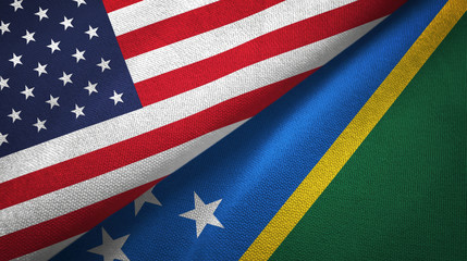 United States and Solomon Islands two flags textile cloth, fabric texture
