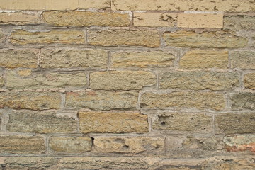 The image of old limestone brick wall closeup.