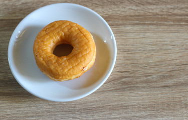 Donuts on wooden background