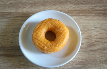 Donuts on wooden background
