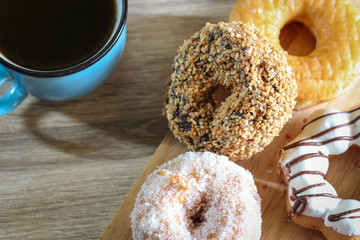 Donuts on wooden background